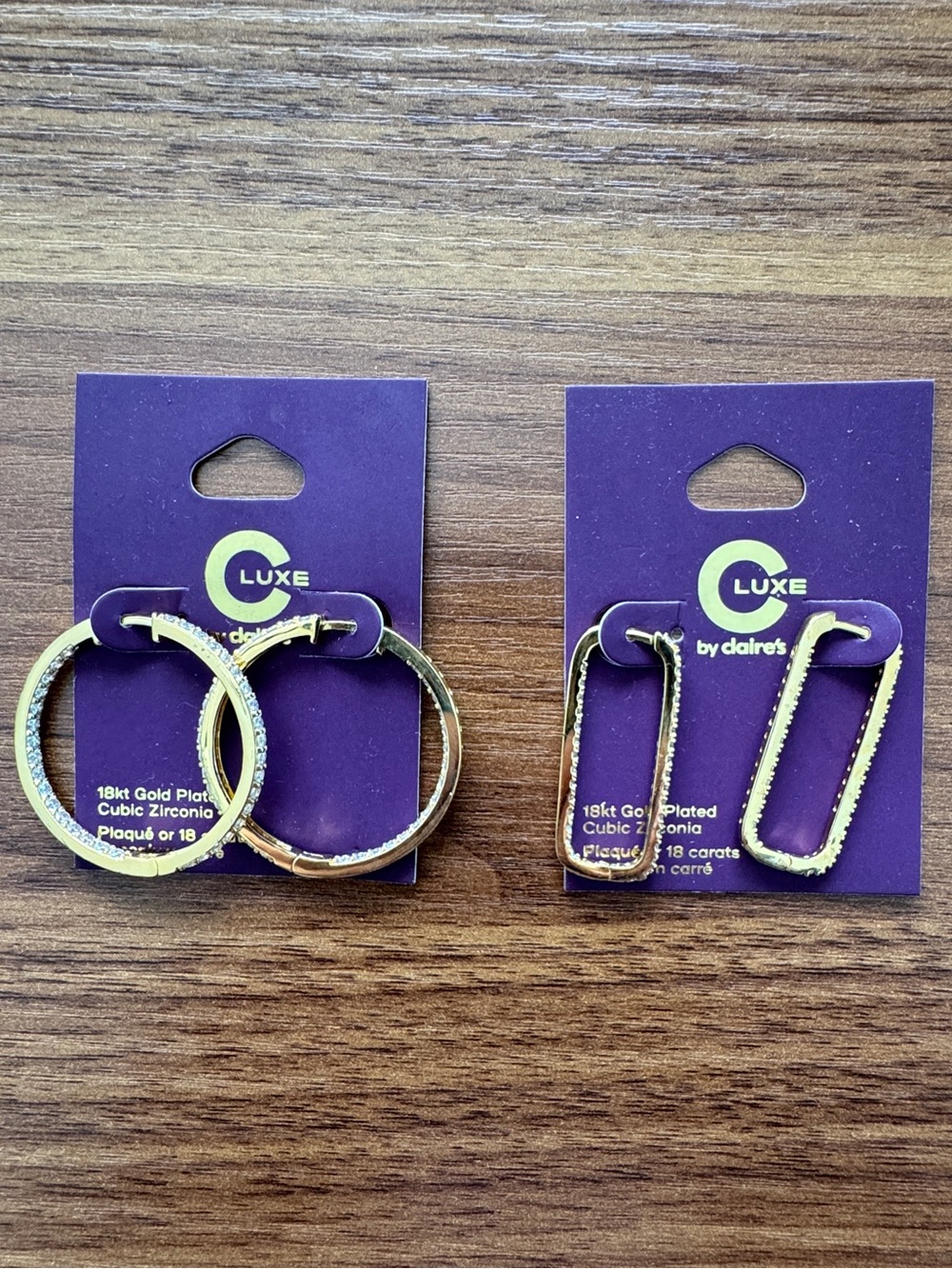 Two pairs of C Luxe by Claire’s 18k gold plated cubic zirconium earrings
